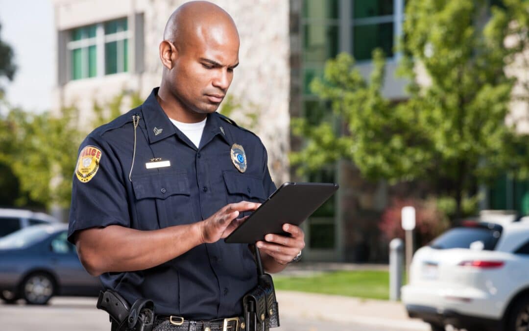 A police officer using a tablet